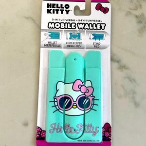 Hello Kitty wallet/phone  NWT attach to phone use also as stand.
